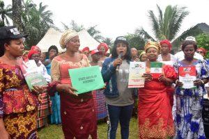 Uhie women with the forms they purchased for Erondu Jr.
